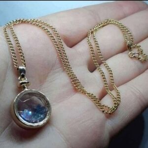Gold color Crystal filled pendant